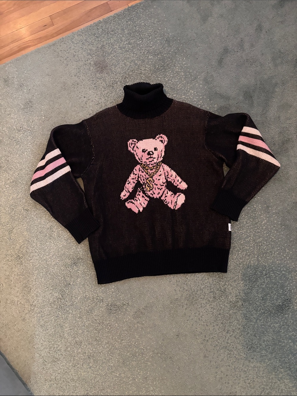 Joyrich Black Knit Turtleneck Sweater with Pink Graphic